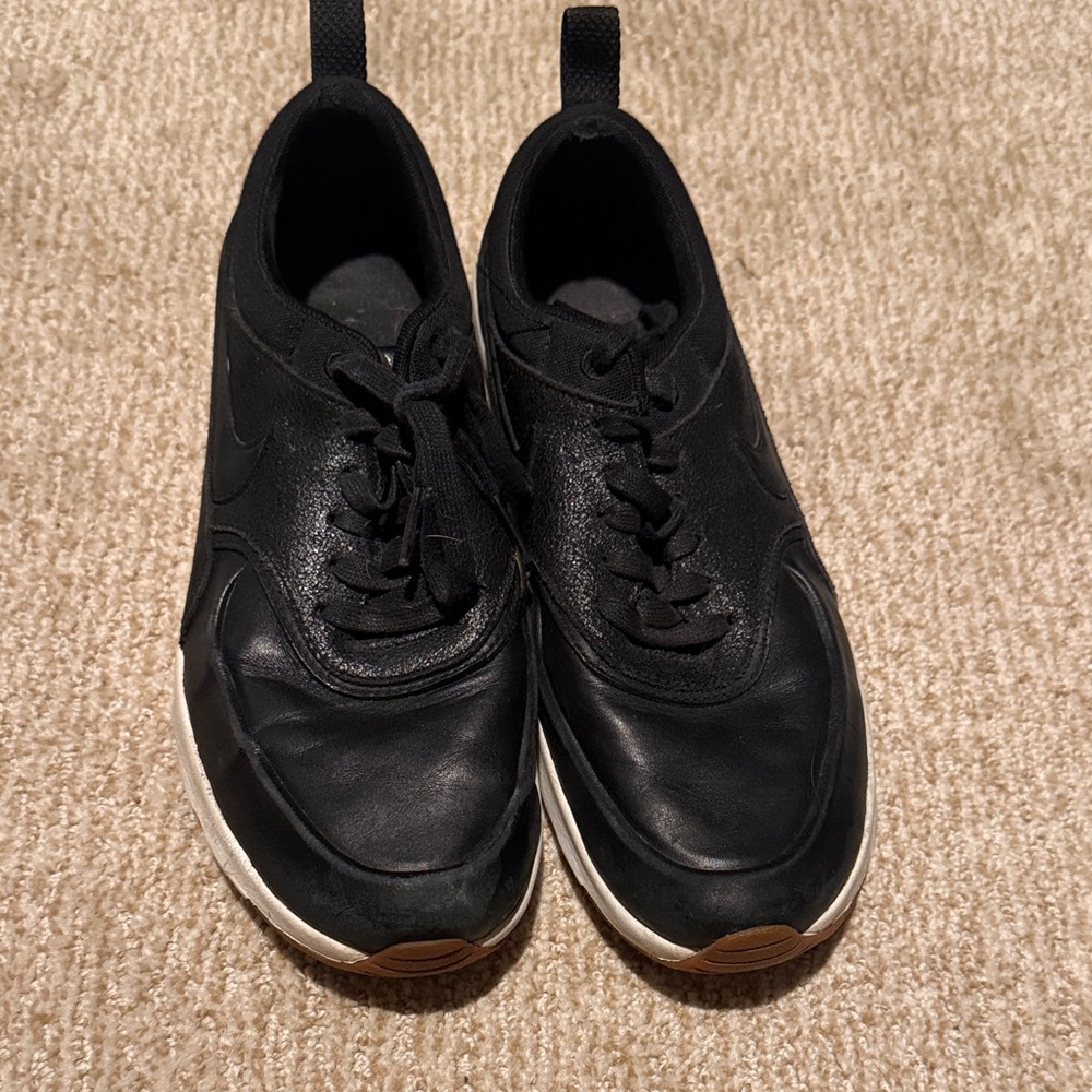 Nike Women's Black Athletic Sneakers with White Midsole
